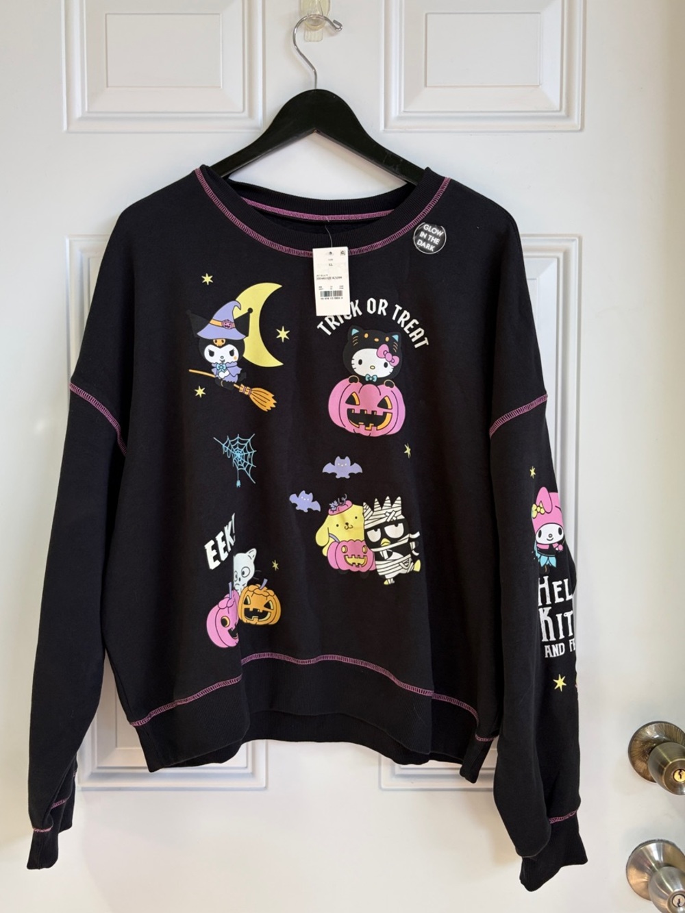Sanrio /Hello Kitty and Friends Halloween Graphic Sweatshirt in black with pink